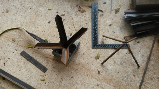 square pyramids made with 4 pcs. iron rod with single weld bead at tip should be self-supporting.